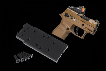 BSOTAC P320 mount base for optic with a handgun on a geometric patterned background